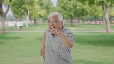 Indian-old-man-dancing-and-enjoying-in-park