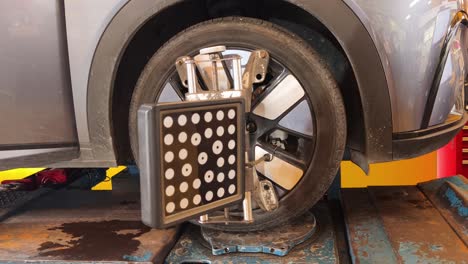 wheel alignment or balancing in a repair shop