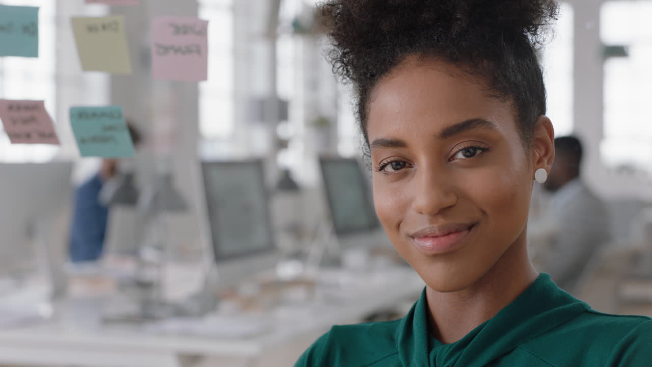 portrait mixed race business woman entrepreneur smiling enjoying successful startup company proud manager in office workspace