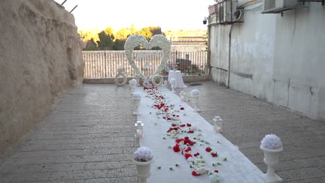 romantic engagement proposal with flowers and heart altar