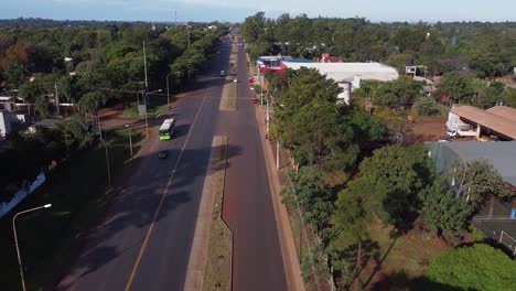 Aerial-view-of-freeway,-Road-in-middle-of-the-trees-and-forest