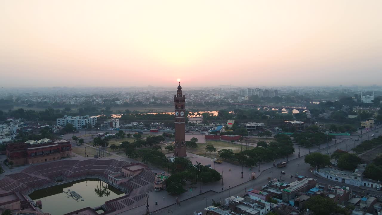 Aerial view of Lucknow's Clock Tower as the city wakes up, with sunrise casting a peaceful atmosphere.