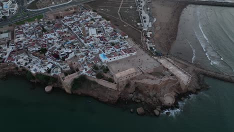 rabat's old city and the kasbah of the udayas are iconic landmarks in morocco, blending history, culture, and stunning views of the atlantic ocean and the bouregreg river.