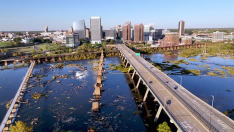 low aerial pullout along bridge leading out of richmond virginia