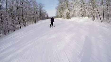 man skiing in snowy area 4k