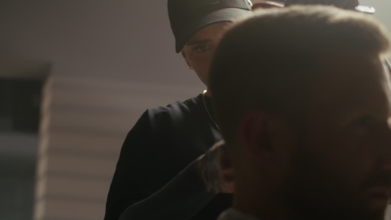 Woman Barber Giving a Haircut