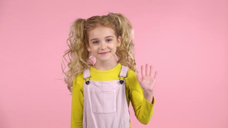 smiling girl waving