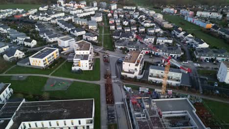 Urban-development-with-building-under-construction-at-Acigné,-Ille-et-Vilaine-in-Brittany,-France