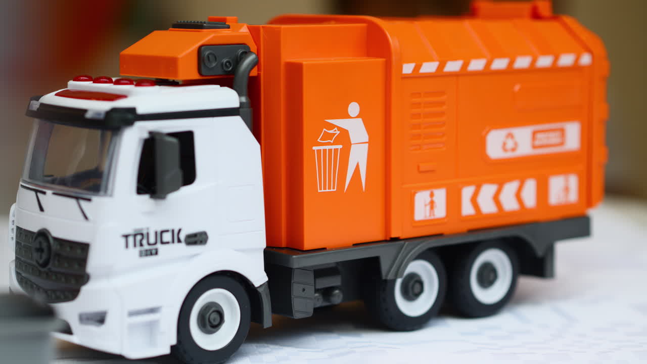 Toy garbage truck, a symbol for learning about waste collection and recycling