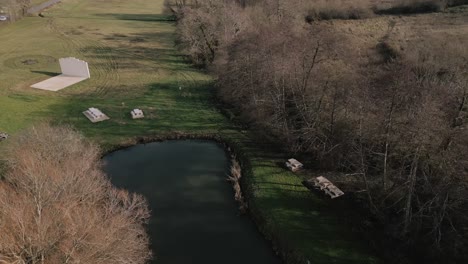 serene lake in saint-vivien-de-blaye, bordeaux, france - aerial