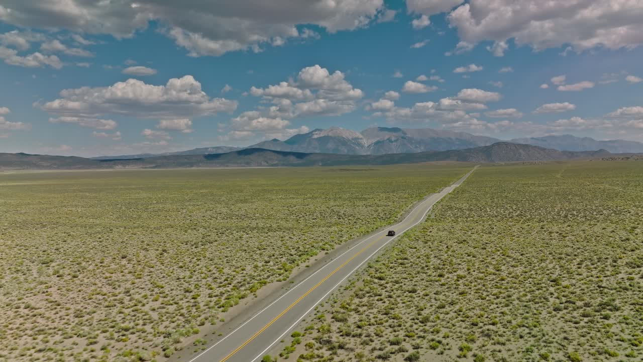 Car driving along road on American road trip with beautiful smooth