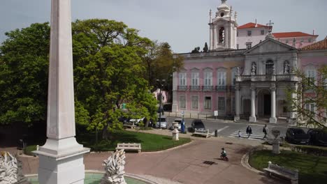 Aerial-Down-Up-Movement-Flying-Over-Beautiful-And-Historical-Park-In-Downtown-Lisbon,-Portugal