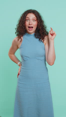woman pointing down saying to subscribe gesturing ok and like promotional information below