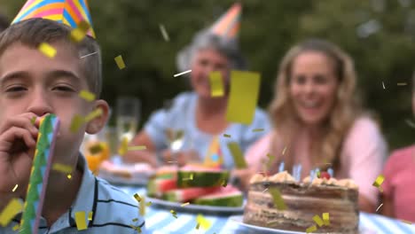 animation of confetti falling over happy family at birthday party