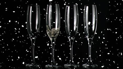 animation of champagne glasses and confetti falling on black background