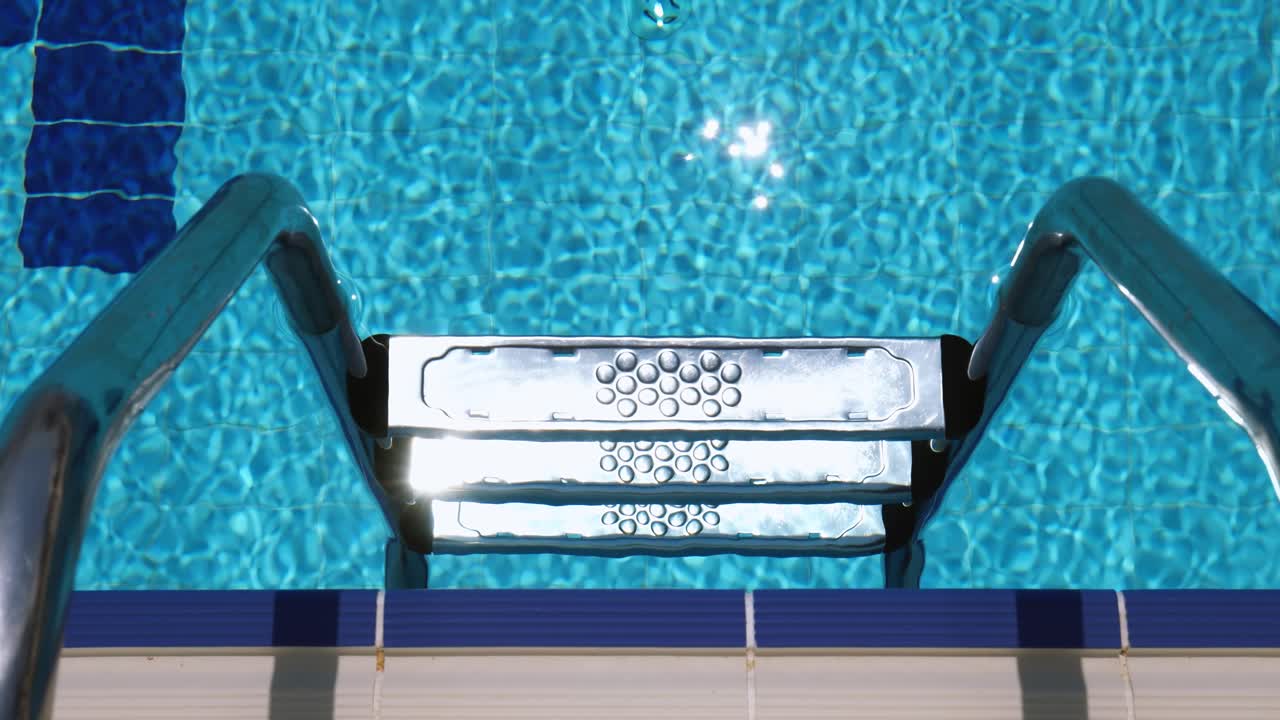 Grab bars ladder in the swimming pool