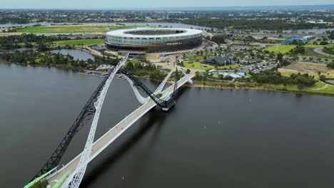 aerial drone view orbiting left looking over the matagarup bridge in perth, wa