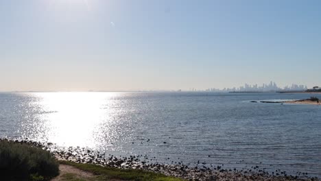 calm ocean waves under a bright sun