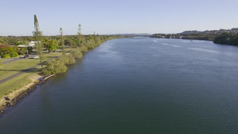 Flying-Over-the-Riverbanks-of-Tweed-River-near-Chinderah,-New-South-Wales,-Australia-Aerial