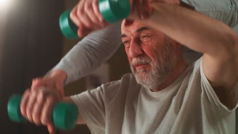 elderly man receiving physical therapy