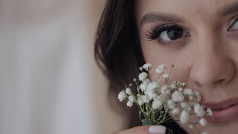 portrait of a beautiful woman with white flowers