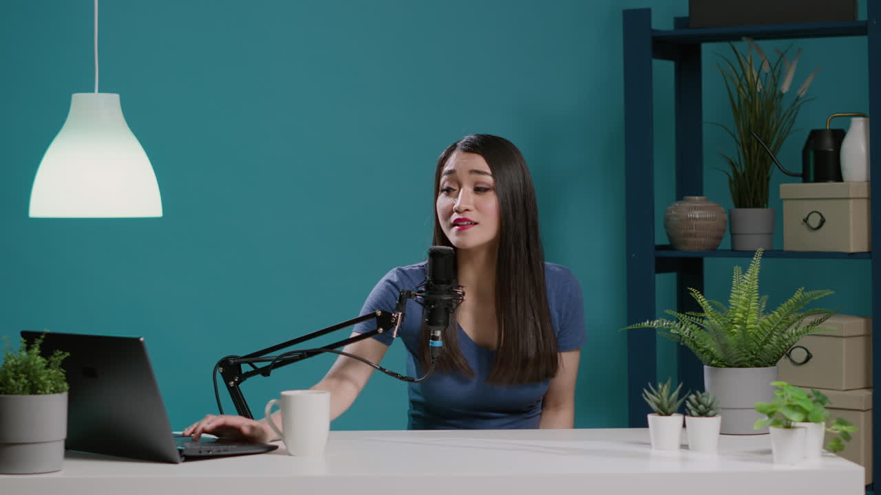 POV of influencer filming online podcast on camera in studio
