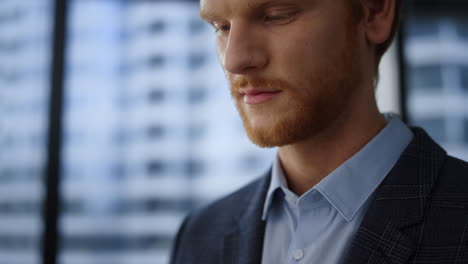 business man working tablet computer in office. manager browsing internet on pad