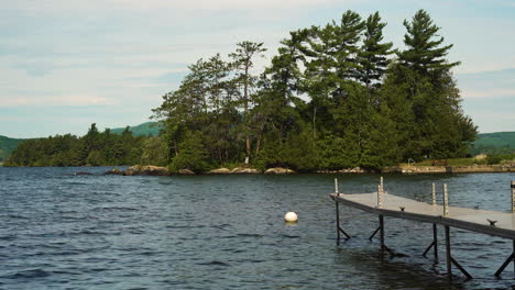 lake dock and mooring over water with waves in new england