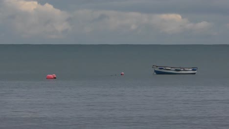 moored fishing boat at boatstrand on the copper coast waterford ireland