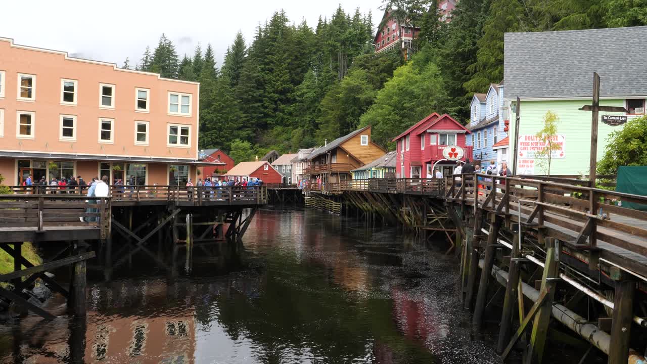 Tourists visiting the famous Historic Creek Street in Ketchikan, Alaska