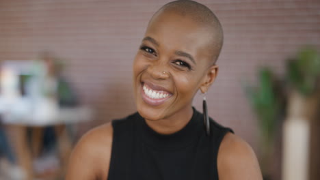 portrait-of-beautiful-african-american-woman-laughing-happy-female-entrepreneur-enjoying-successful-lifestyle-wearing-stylish-fashion-in-office-workspace