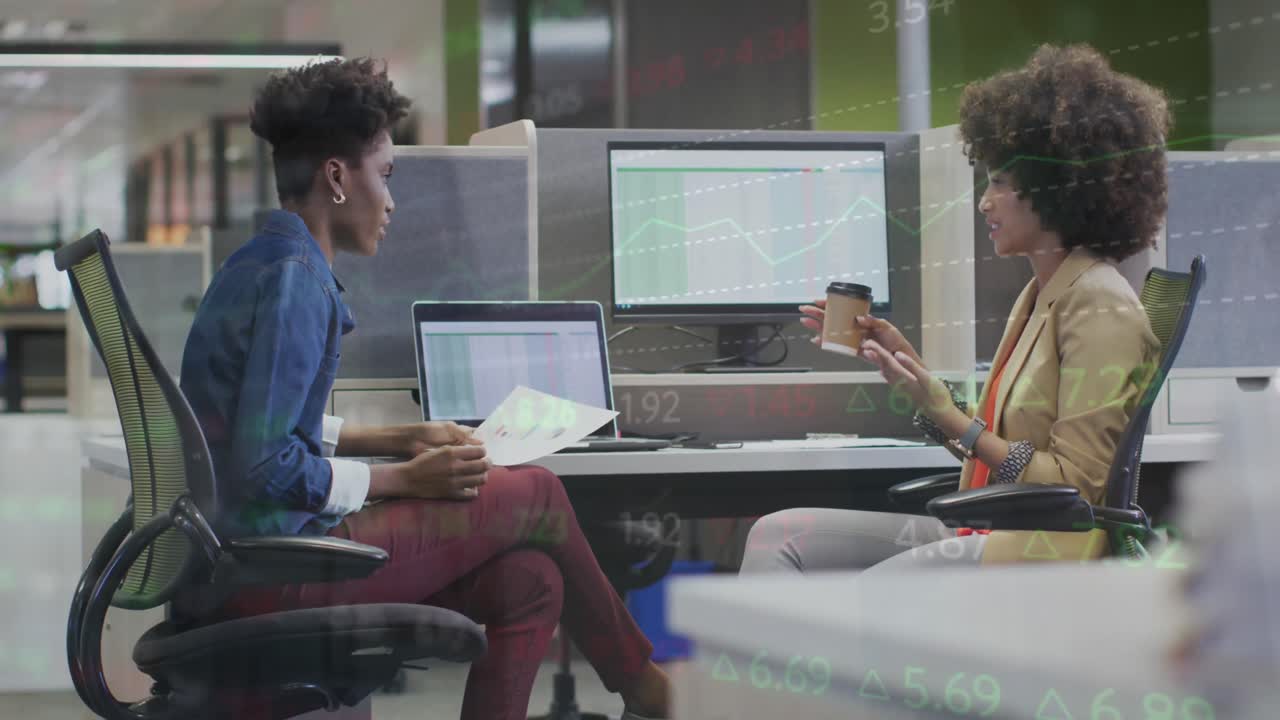 Animation of financial data processing over diverse business people at office