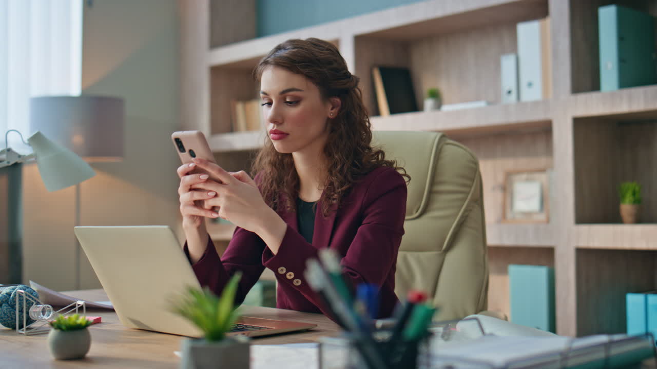 Happy worker receive message with good news in office. Smiling manager rejoicing