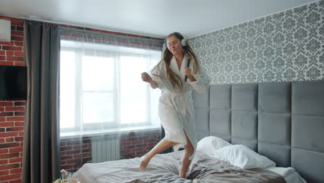 woman dancing in a hotel room