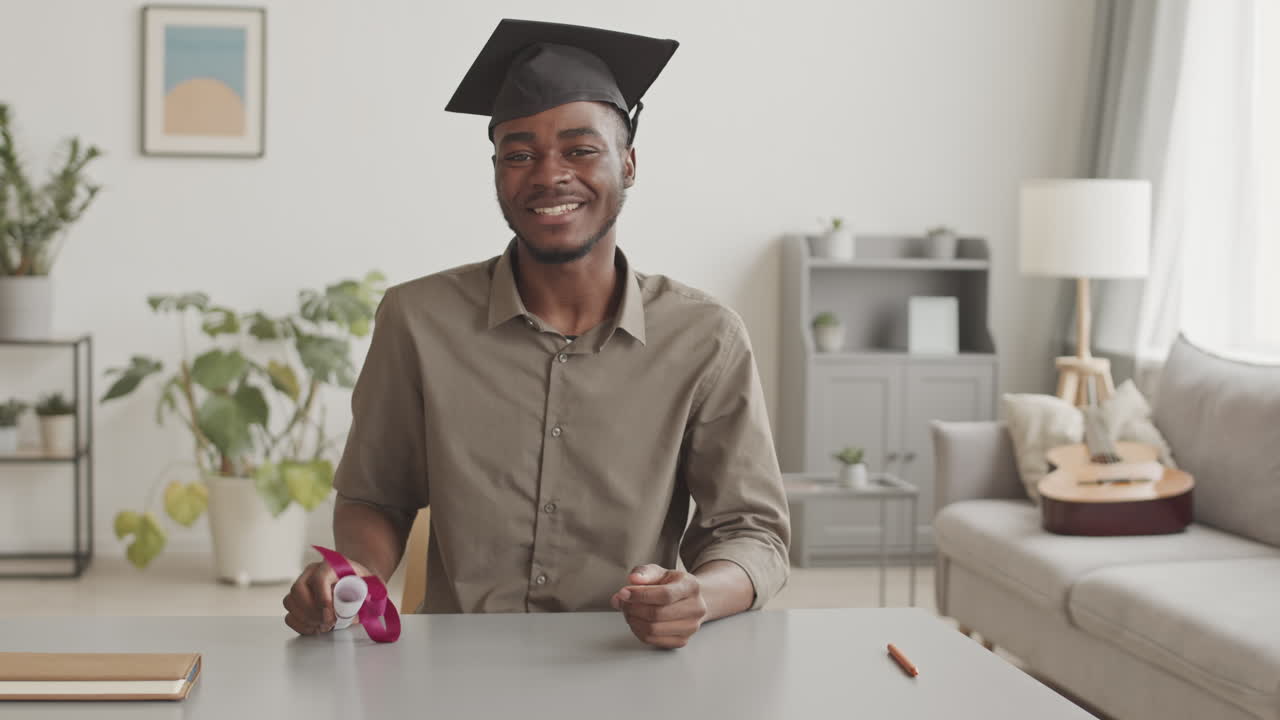 African Student Having Graduation Ceremony by Internet