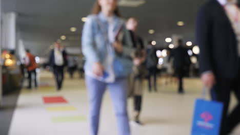 blurred image of a crowded hallway