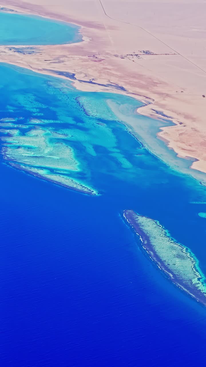 Blue turquoise desert coast of Egypt seeing from an airplane