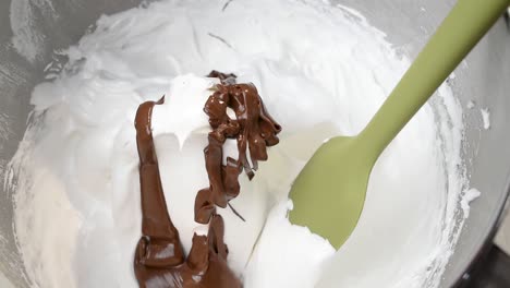 homemade meringue with melted chocolate folded in gently