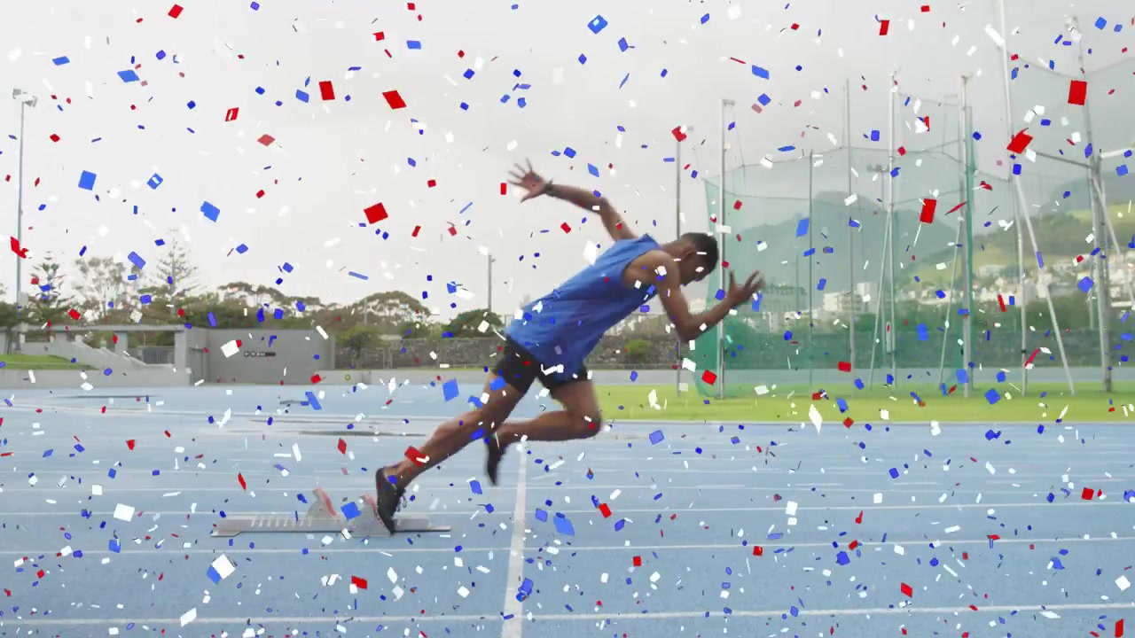 Sprinter masculino partindo dos blocos de partida ao sinal, em um sprint pela pista azul com sobreposição de confetes.