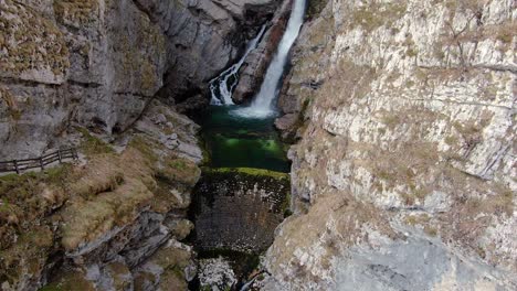 Aerial-tilt-up-view-of-the-Mostnica-Gorge-through-the-Voje-valley