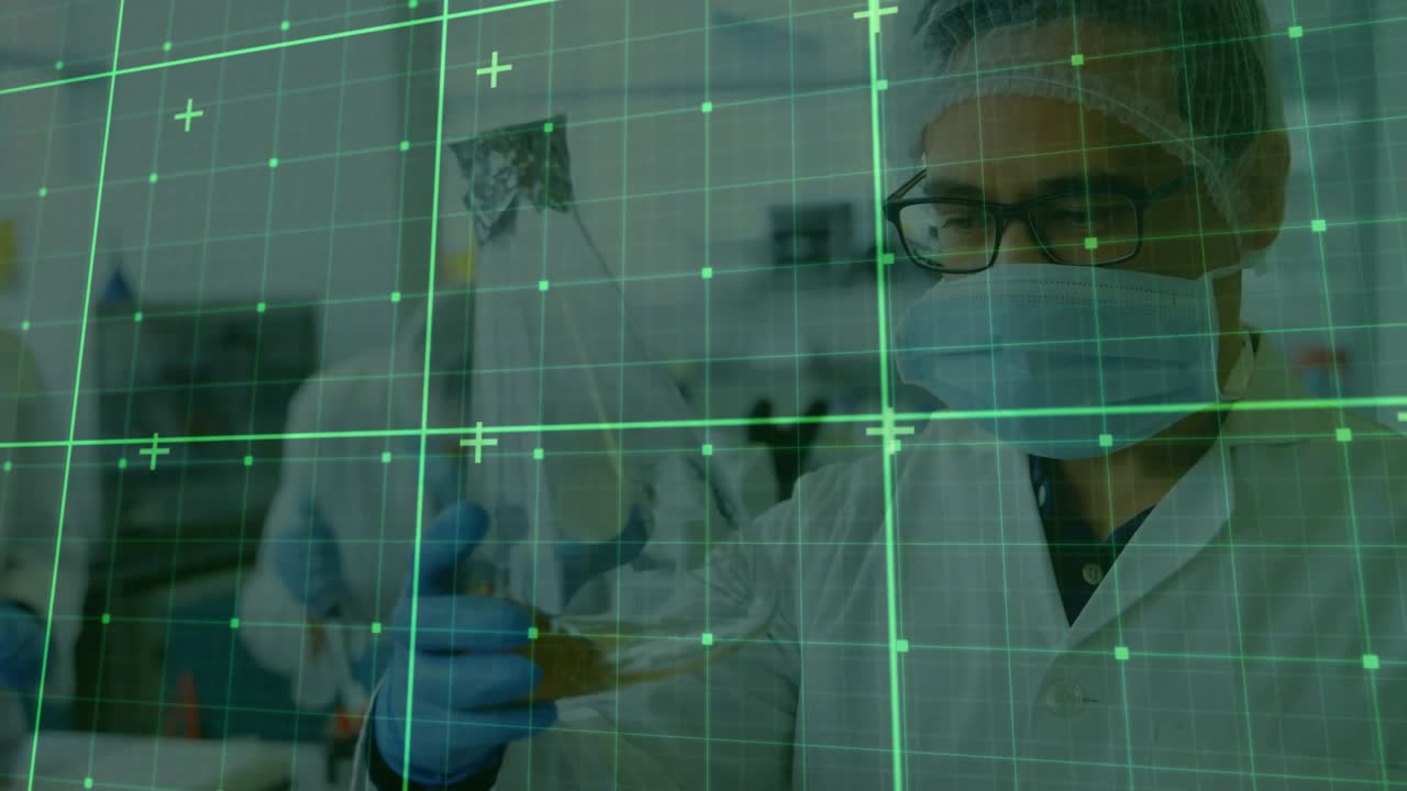 Entering holding flask scientist inspecting solution color under scanning grid in chemistry lab