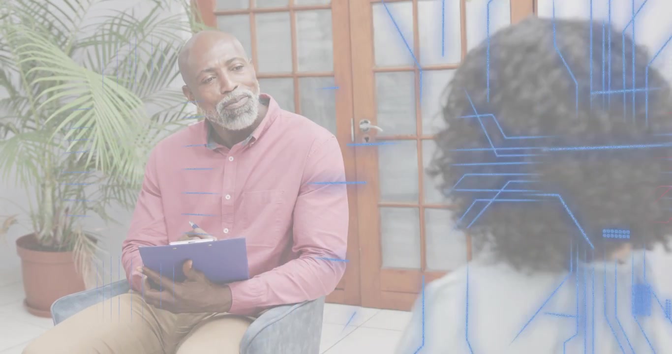 Male therapist writing notes, initiating blue circuitry network dissipating as therapy session ends