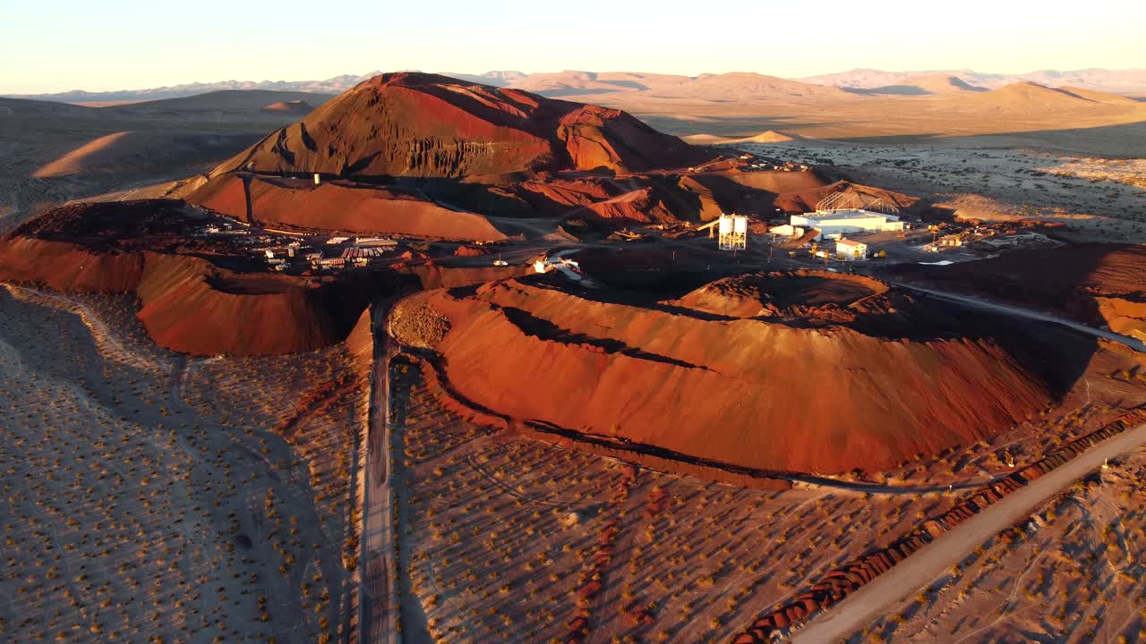 US, NV, Amargossa Valley, Lathrop Wells Cone, 2025-01-15 - Drone view of a volcanic cinder cone and the mining operation around it