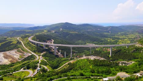 stunning 4k drone footage of the iconic črni kal bridge in slovenia, a masterpiece of architecture amid breathtaking natural surroundings