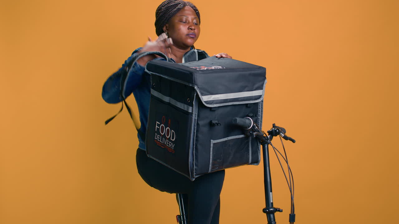 Woman Grabs Takeaway From Delivery Bag