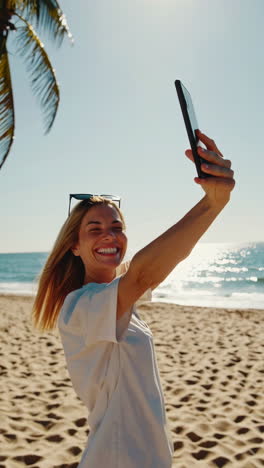 people enjoying a sunny beach vacation and taking selfies