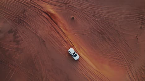 aerial view of a 4x4 vehicle in the desert