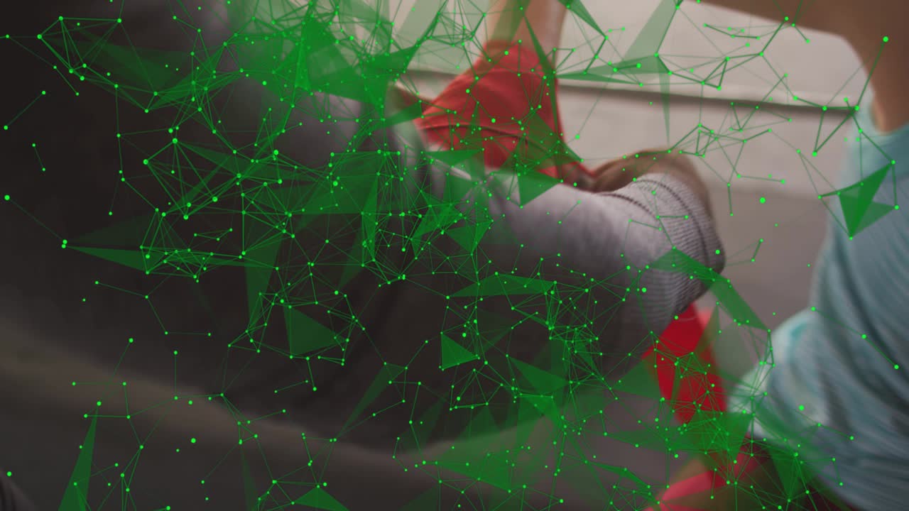 Woman wrapping man's wrist after finger extension showing health care with red wrap green overlay