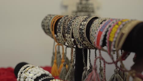 hebrew quote with bracelets at a store cinematic shot