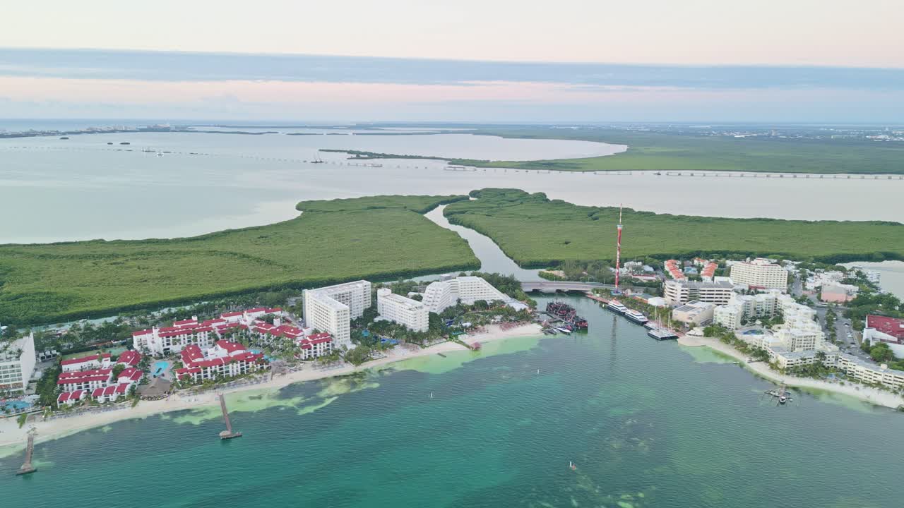 Cancun Hotel Zone aerial view with Playa Langosta beach, Nichupte Lagoon, and resorts